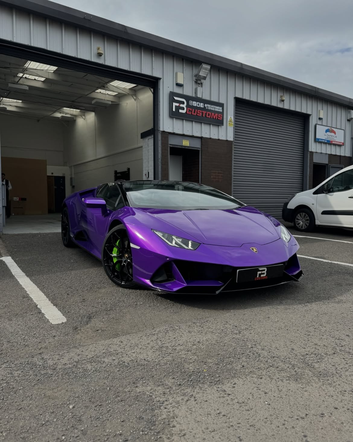 Purple Lamborghini Huracán outside FB CUSTOMS
