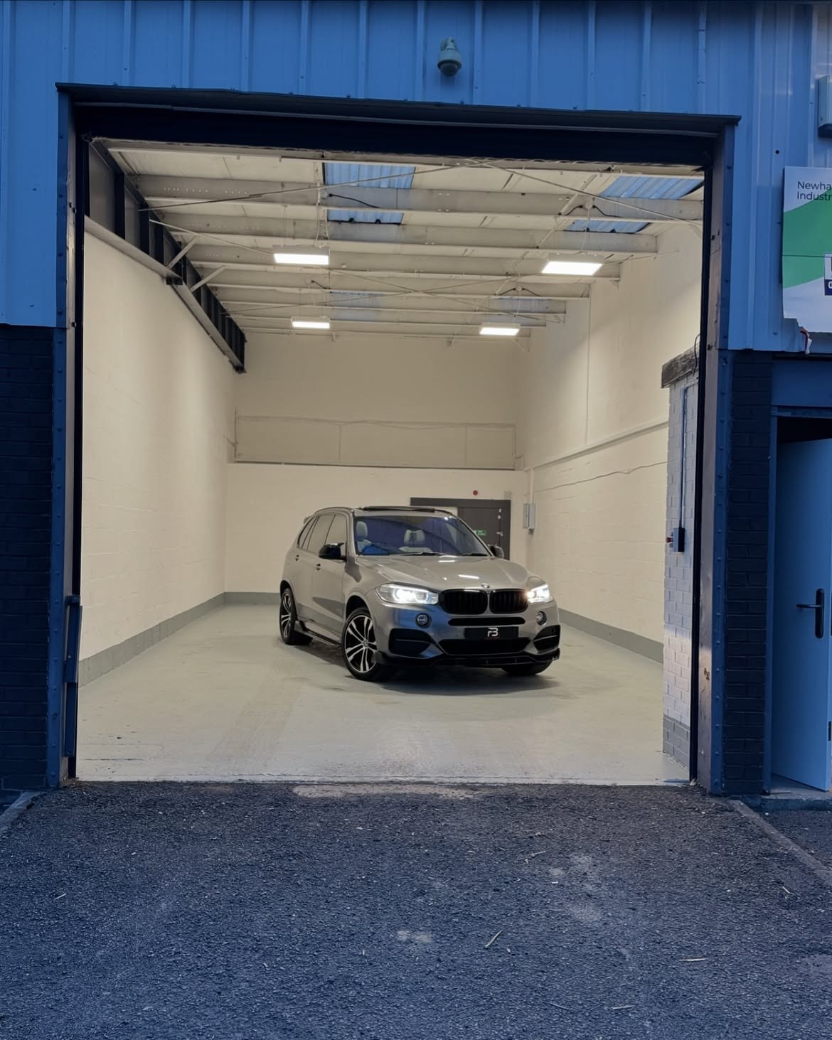 BMW X5 parked inside the workshop