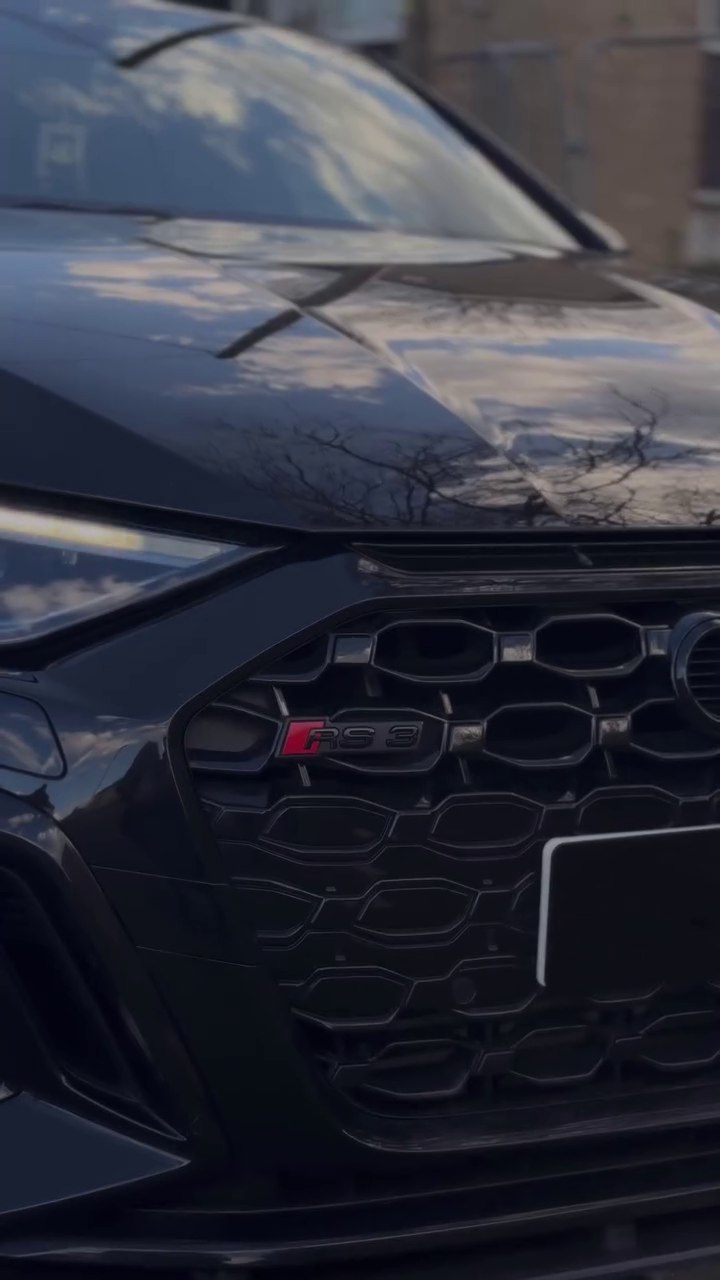 Close view of a black Audi RS 3 grille