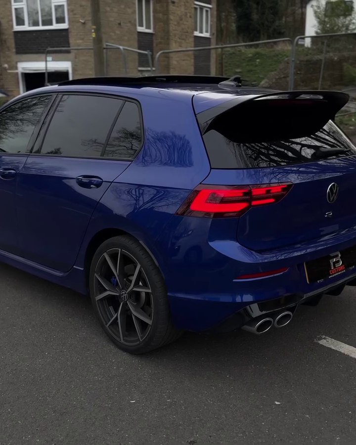 Blue Volkswagen with dark side and rear windows